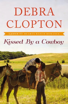Kissed by a Cowboy (A Four of Hearts Ranch Romance) *Very Good*